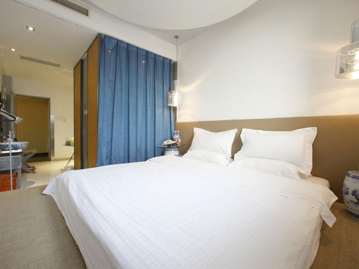 China Community Art Habitat Hotel Циндао Стая снимка